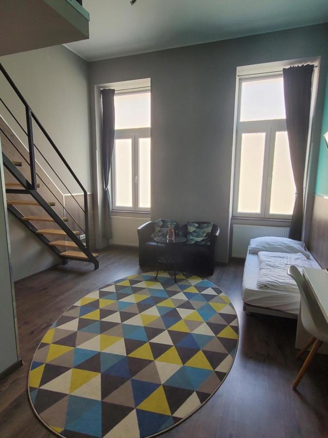 Chambre Triple - Vue sur Ville